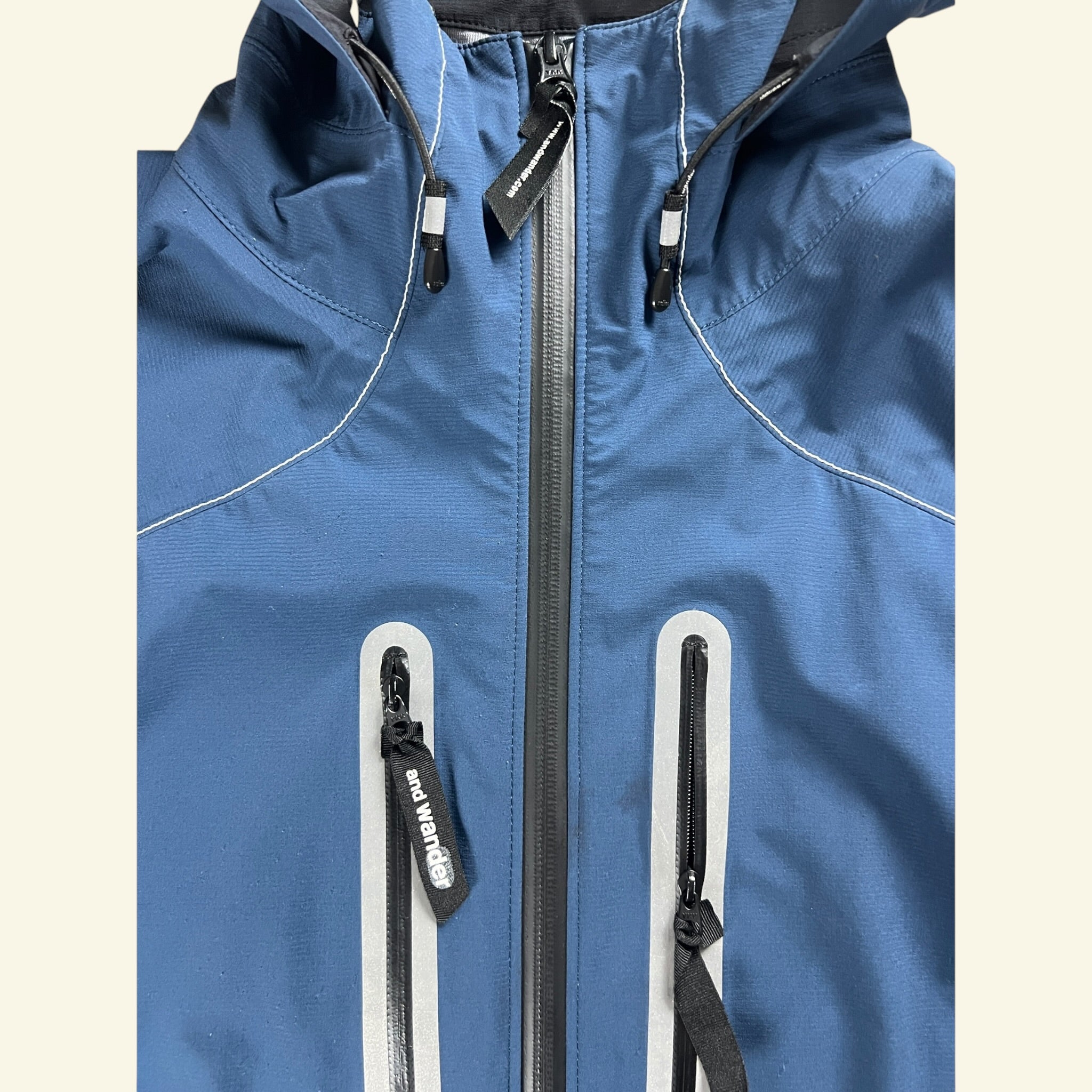 And Wander Pertex Shield Nylon Hooded Jacket