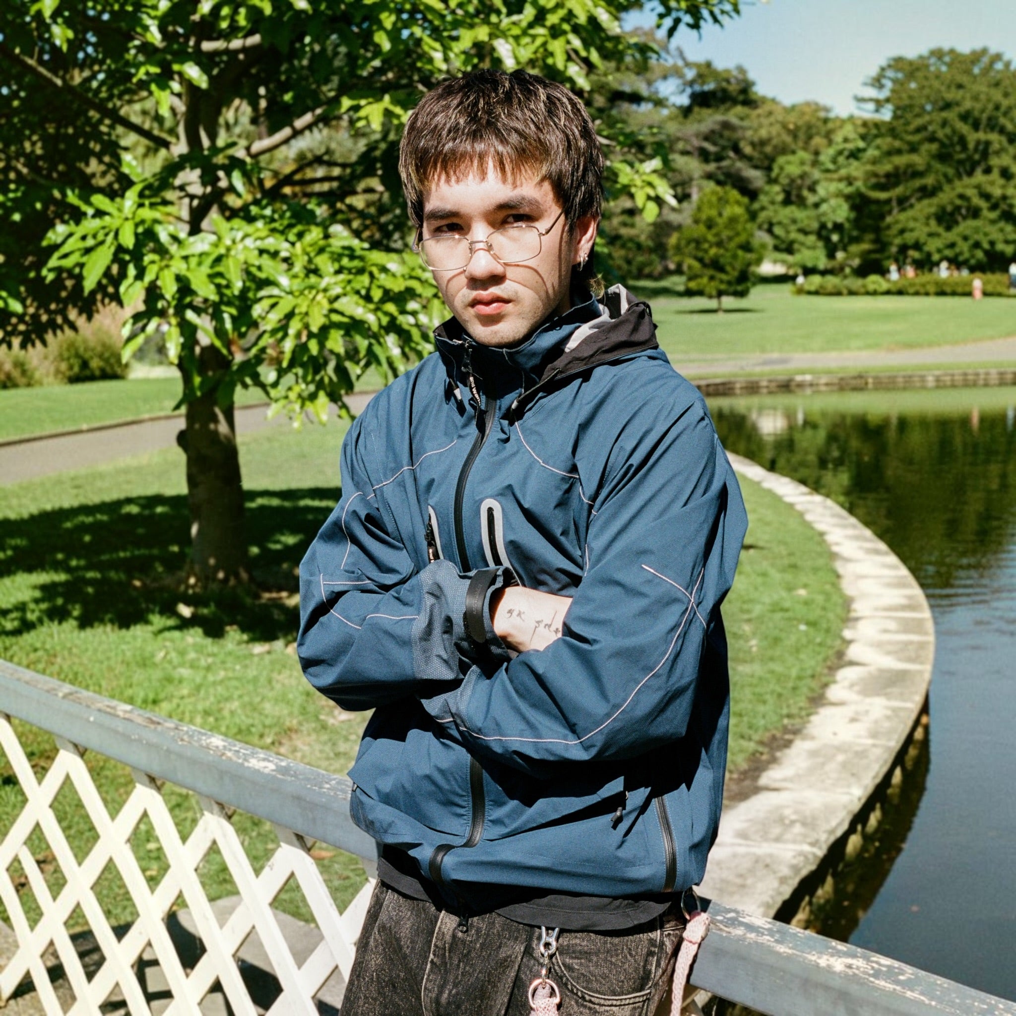 And Wander Pertex Shield Nylon Hooded Jacket