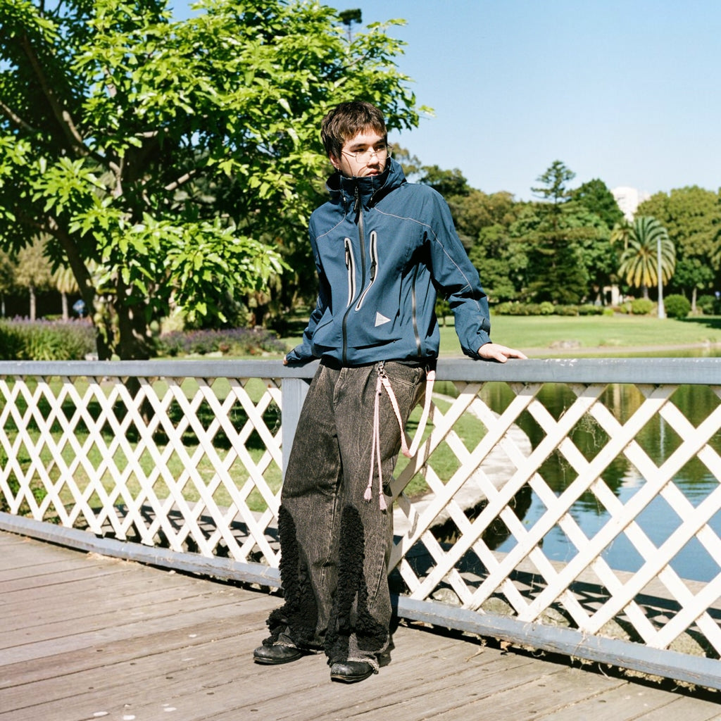 And Wander Pertex Shield Nylon Hooded Jacket